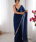 blue sequinned satin saree