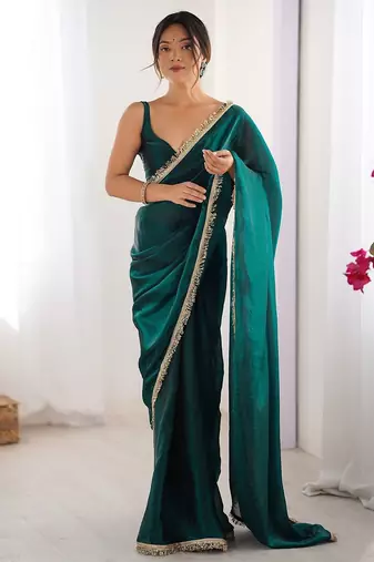 Teal sequinned satin saree
