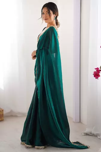 Teal sequinned satin saree
