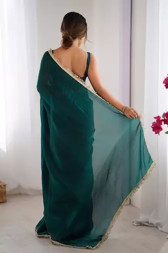 Teal sequinned satin saree