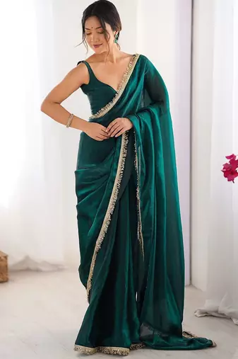 Teal sequinned satin saree