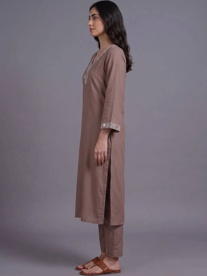 women embroidered regular mirror work kurta with trousers