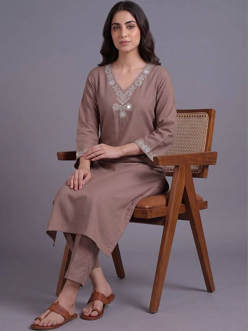 women embroidered regular mirror work kurta with trousers