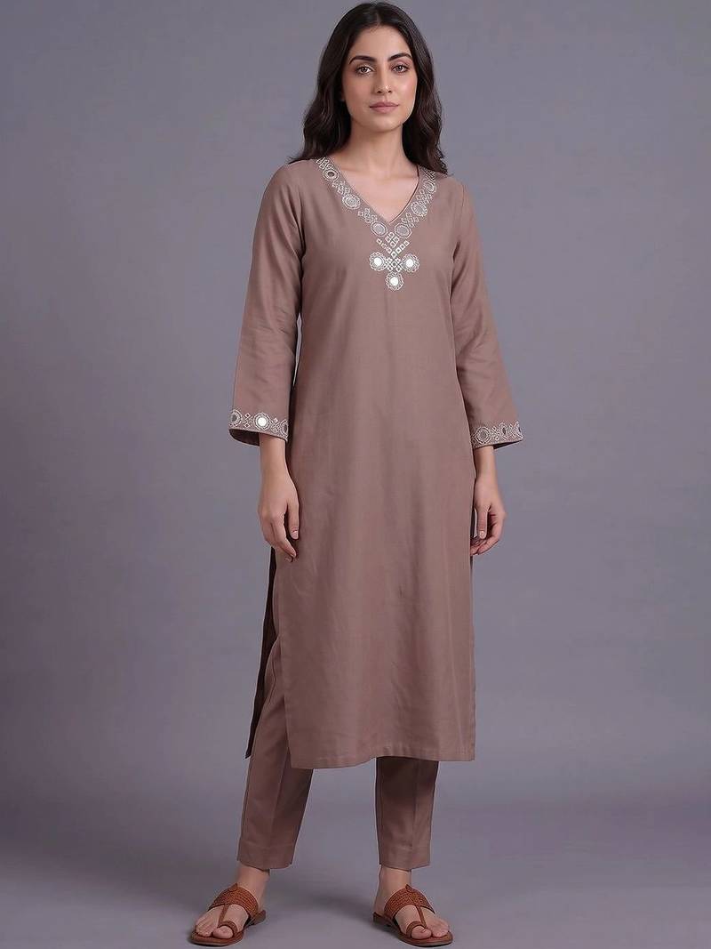 women embroidered regular mirror work kurta with trousers