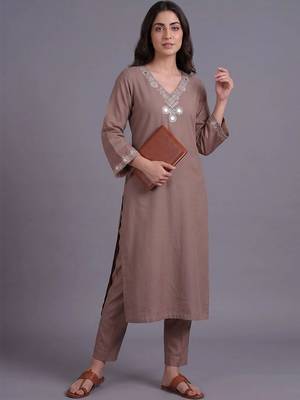 women embroidered regular mirror work kurta with trousers 6
