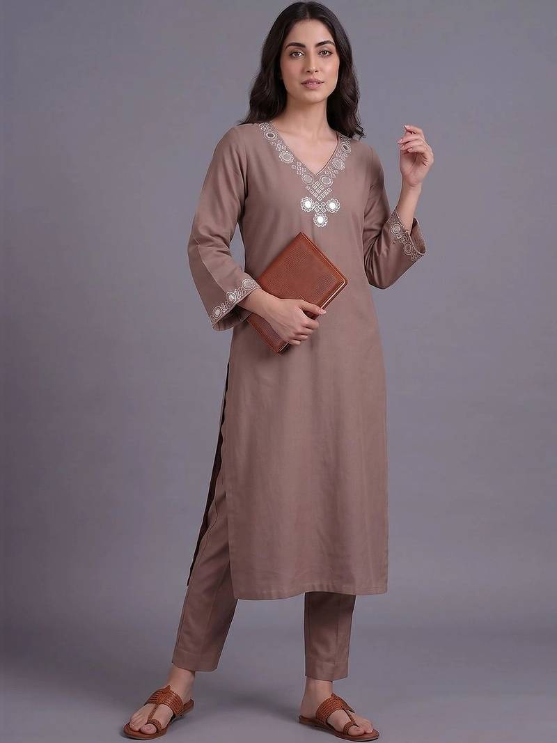 women embroidered regular mirror work kurta with trousers