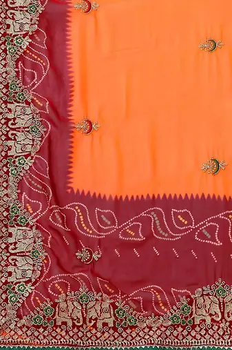 Orange orange ethnic motifs embroidered bandhani saree