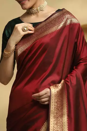 Maroon woven embellished pure silk kanjivaram saree with  blouse
