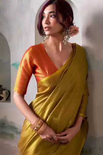 Gold zari tissue woven design saree with contrast blouse piece