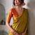 Gold zari tissue woven design saree with contrast blouse piece