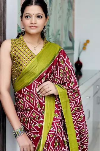 Maroon ethnic motifs printed designer ikat saree