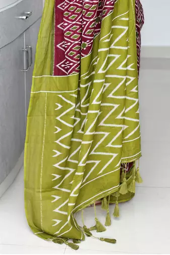 Maroon ethnic motifs printed designer ikat saree