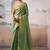 Green solid zari saree with blouse piece