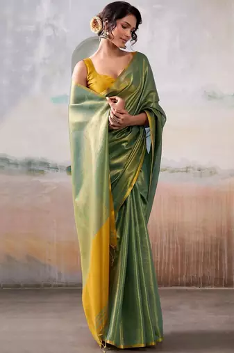 Green solid zari saree with blouse piece