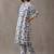 women printed regular cotton kurta with trousers