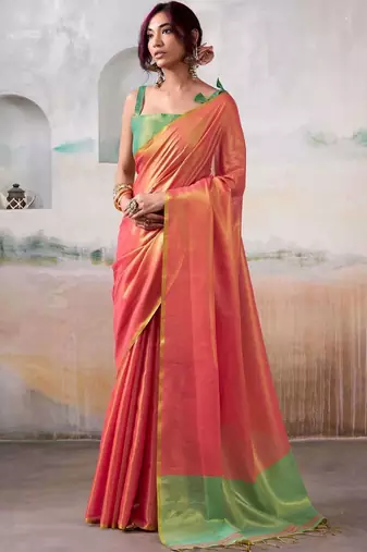 Peach woven design zari tissue saree with contrast blouse piece