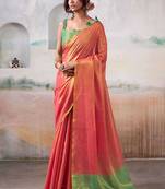 Peach woven design zari tissue saree with contrast blouse piece