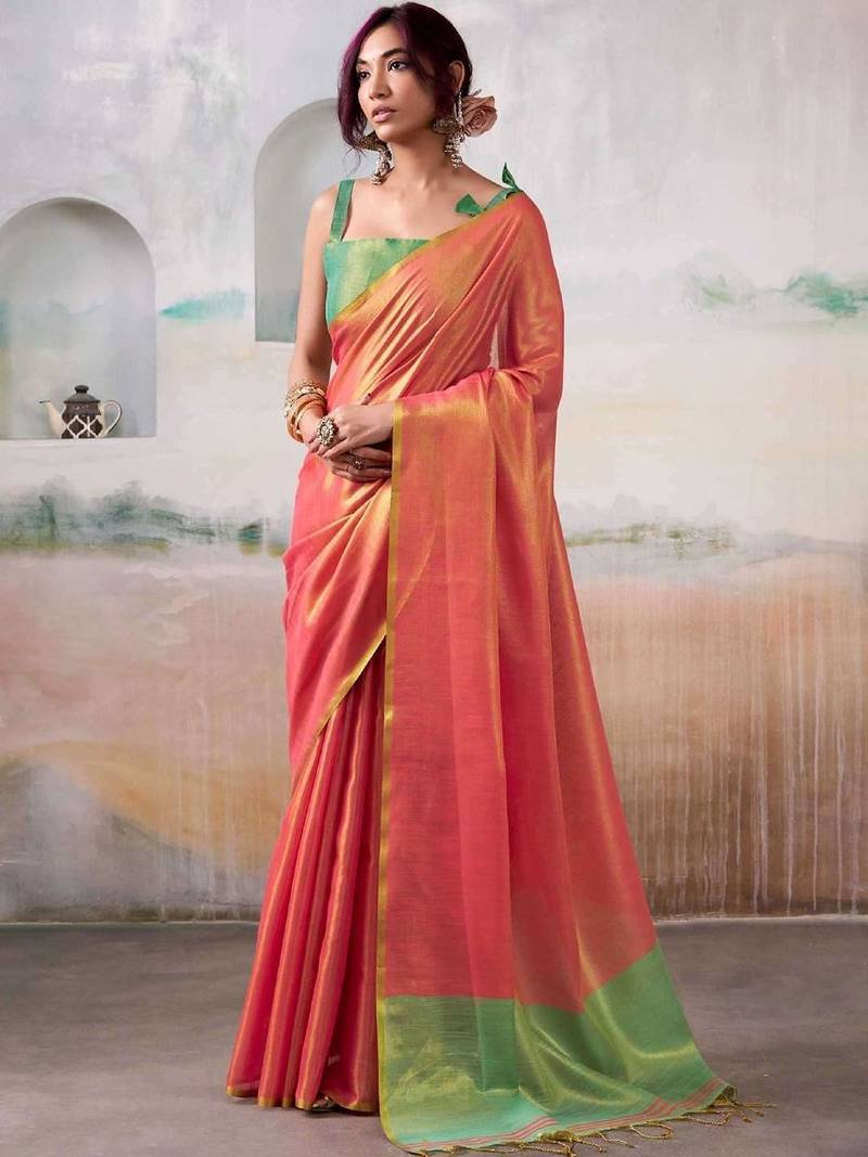 Peach woven design zari tissue saree with contrast blouse piece