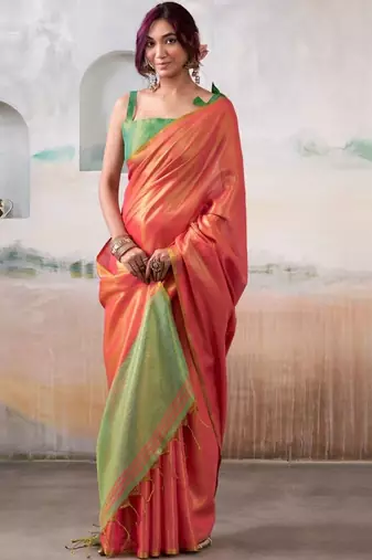 Peach woven design zari tissue saree with contrast blouse piece
