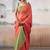 Peach woven design zari tissue saree with contrast blouse piece