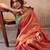 Peach woven design zari tissue saree with contrast blouse piece