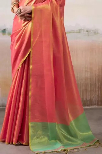 Peach woven design zari tissue saree with contrast blouse piece