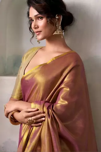 Pink woven design zari tissue saree