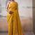 Yellow zari tissue woven design saree with contrast blouse piece