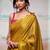 Yellow zari tissue woven design saree with contrast blouse piece