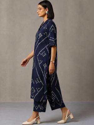 women printed regular cotton kurta with trousers 6
