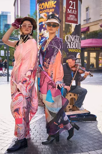 Peach peach-coloured purple abstract printed poly crepe saree