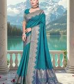 banarasi teal silk blend saree with golden zari border work and tassels with blouse