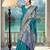 banarasi teal silk blend saree with golden zari border work and tassels with blouse