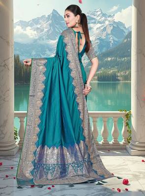banarasi teal silk blend saree with golden zari border work and tassels with blouse 3
