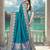 banarasi teal silk blend saree with golden zari border work and tassels with blouse