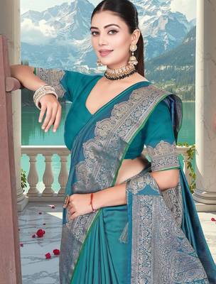 banarasi teal silk blend saree with golden zari border work and tassels with blouse 4
