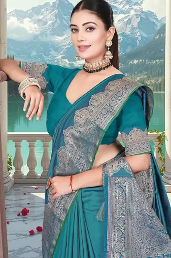 banarasi teal silk blend saree with golden zari border work and tassels with blouse