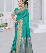 banarasi rama silk blend saree with golden zari border work and tassels with blouse