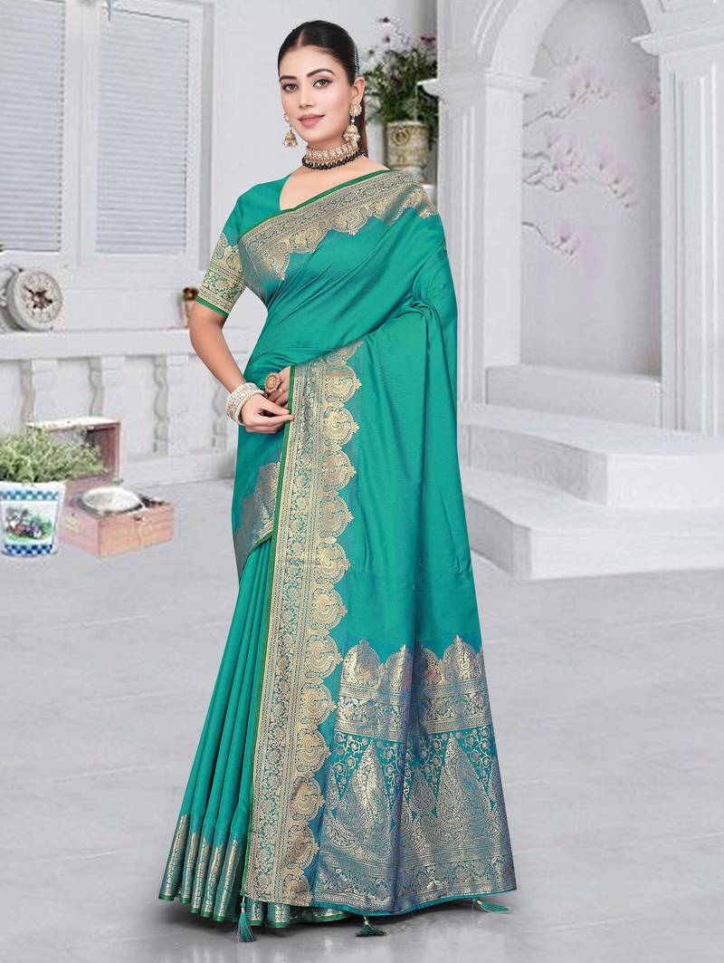banarasi rama silk blend saree with golden zari border work and tassels with blouse