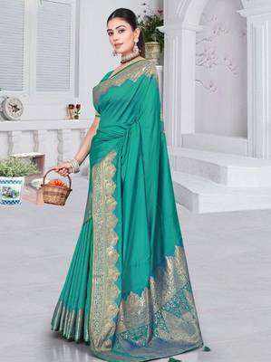 banarasi rama silk blend saree with golden zari border work and tassels with blouse 2