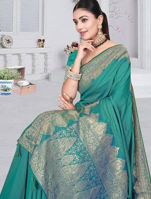 banarasi rama silk blend saree with golden zari border work and tassels with blouse 4