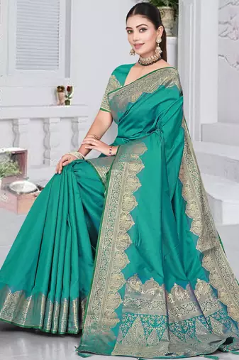 banarasi rama silk blend saree with golden zari border work and tassels with blouse