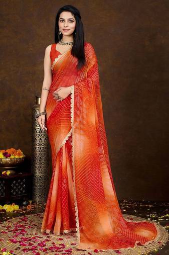 orange women bandhani printed embellished saree