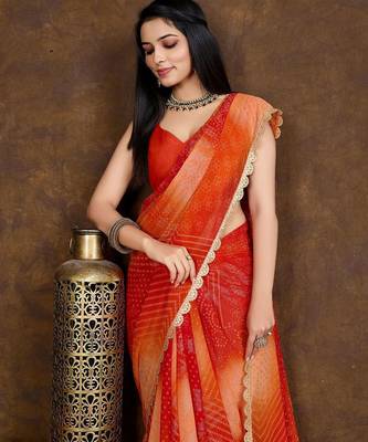 orange women bandhani printed embellished saree 2