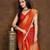 orange women bandhani printed embellished saree