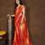 orange women bandhani printed embellished saree