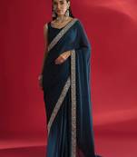 blue sequinned satin saree