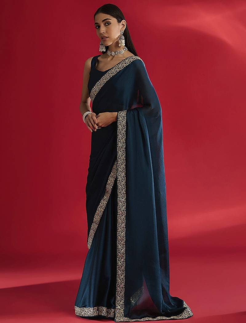 blue sequinned satin saree