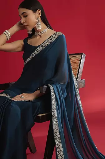 blue sequinned satin saree