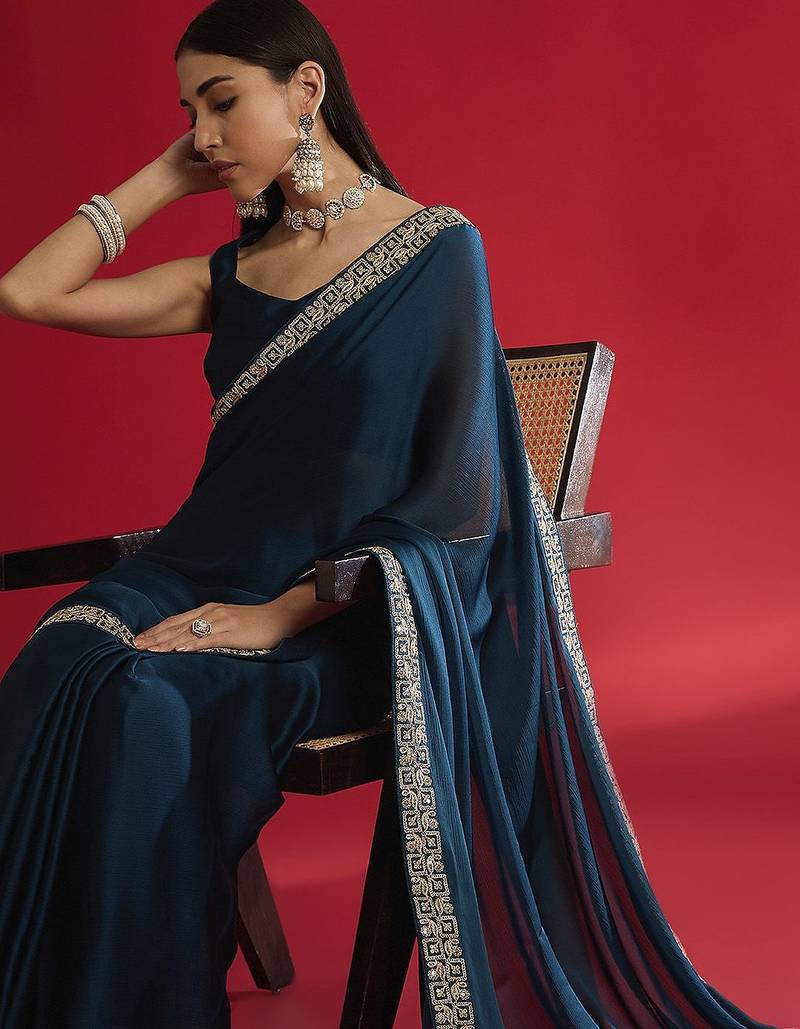 blue sequinned satin saree